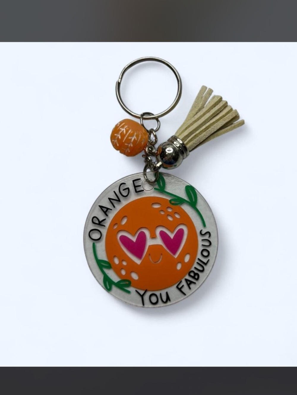 Hand Crafted Orange Keychain with Pink Heart Eyes and Tan Tassel